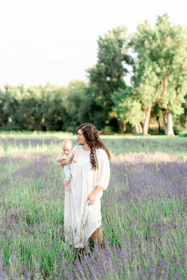 mom and baby in a lavender field