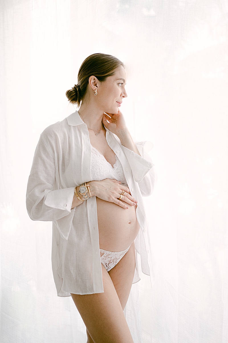 intimate maternity session in studio photographed by Kamy Photographie in Miami, FL