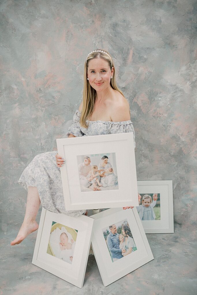 headshot image of Marie-Elizabeth Photography showing off her client artwork featured on The Motherhood Anthology