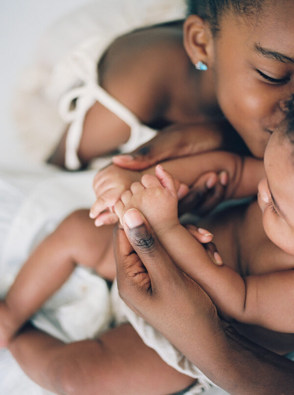 baby hands studio photography session photographed by Rooted Love Photography in Orlando, FL featured on The Motherhood Anthology blog