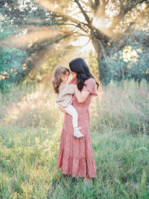 mom & me photography session in outdoor field photographed by Rooted Love Photography in Orlando, FL featured on The Motherhood Anthology blog