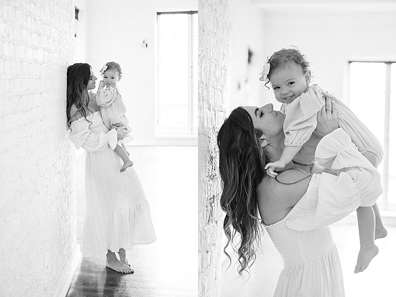 mommy + me session in-home natural light window light organic photographed by Mckenize Fairclough in Richmond, VA black and white mom and baby girl snuggling