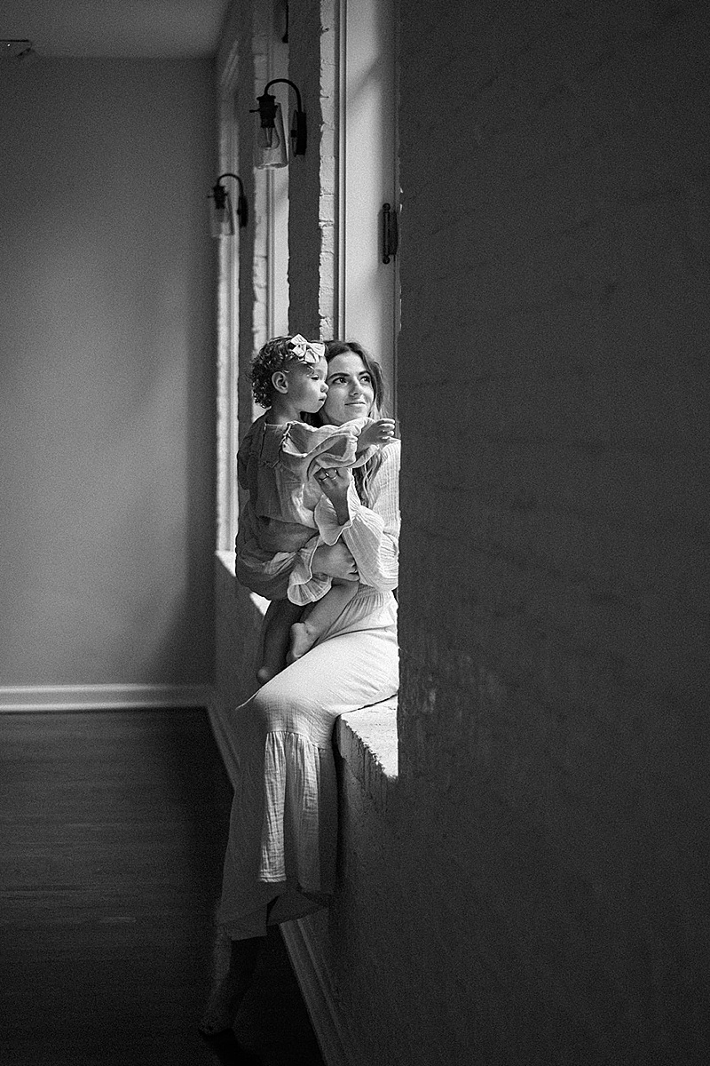 mommy + me session in-home natural light window light organic photographed by Mckenize Fairclough in Richmond, VA black and white