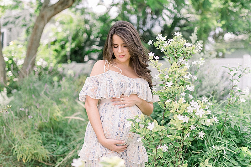 intimate maternity garden photography Olga Clarke photography west palm beach fl light and airy 