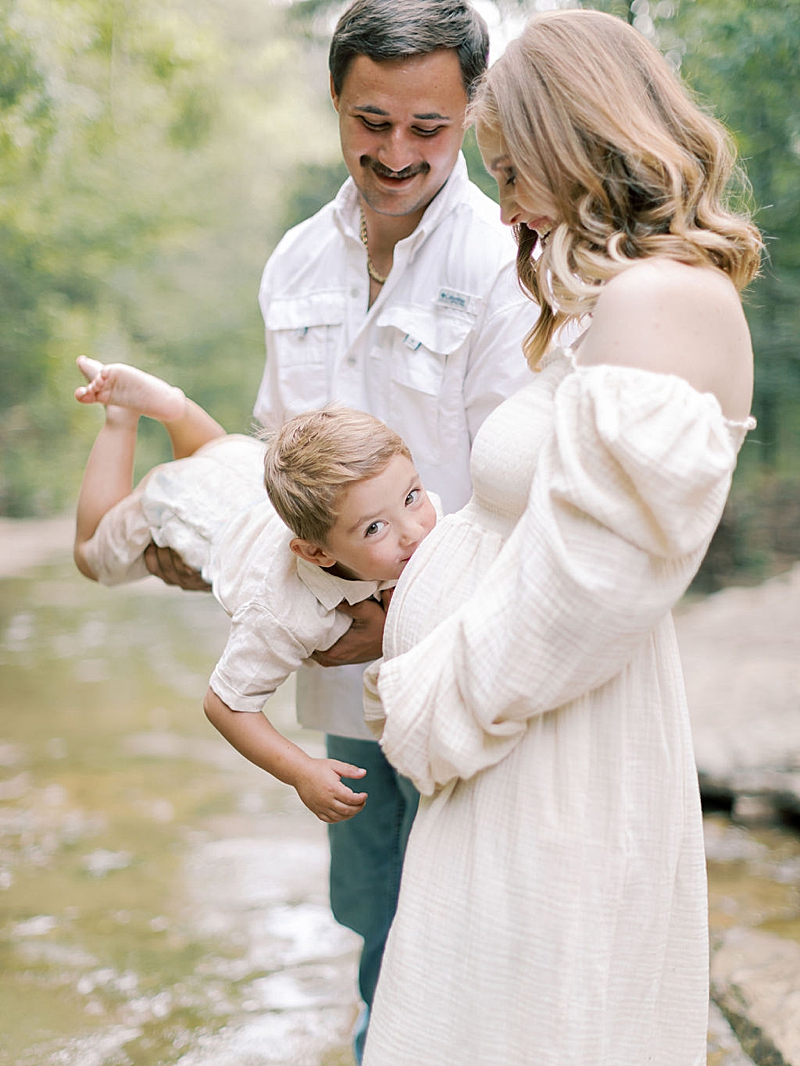 outdoor family and maternity session photography creekside natural light playful photography